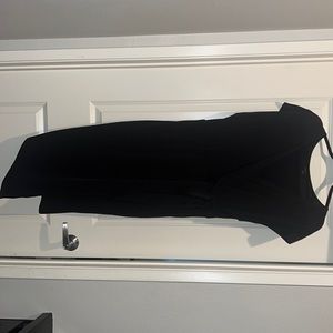 Torrid black wrap around dress with side tie. Selling because it no longer fits.